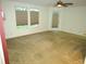 Spacious living room with natural light and a sliding door at 6028 Westgate Dr # 104, Orlando, FL 32835