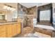 Bathroom boasts a custom walk-in shower with dual shower heads and a soaking tub at 6301 Oak Shore Dr, St Cloud, FL 34771