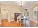 Cozy dining room with hardwood floors and a view of the backyard at 6301 Oak Shore Dr, St Cloud, FL 34771