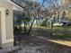 A spacious backyard with lush trees allows for peaceful afternoons outdoors at 6356 Bennett Ct, St Cloud, FL 34771