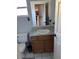 A simple bathroom features a single sink vanity and tile flooring at 6356 Bennett Ct, St Cloud, FL 34771