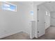 Bright hallway with natural light, carpeted floor and access to bedrooms or bathrooms at 6699 Alder Rd, Harmony, FL 34773