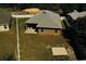 Aerial view of the home showing the expansive backyard, including a patio and fenced yard at 881 Hudson Valley Dr, Kissimmee, FL 34759