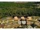 Aerial view of the house situated near a natural wooded area at 881 Hudson Valley Dr, Kissimmee, FL 34759