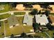 Aerial view of the house and property including the backyard at 881 Hudson Valley Dr, Kissimmee, FL 34759