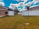 Spacious backyard with a privacy fence, providing a secure outdoor space at 881 Hudson Valley Dr, Kissimmee, FL 34759