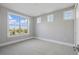 Bedroom with neutral colored walls and carpet with view of the neighborhood at 10196 Bucklow Hill Dr, Orlando, FL 32832