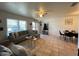 Bright living space featuring tile floors, neutral paint, and dining area at 113 Las Brisas Way, Kissimmee, FL 34743