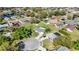 Aerial view of neighborhood highlighting the home's location, expansive lot, and pool at 1240 Beth Ln, St Cloud, FL 34772