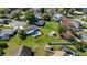 Aerial view featuring backyard with pool, shed, and spacious, well-manicured lawn at 1240 Beth Ln, St Cloud, FL 34772