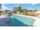 Inviting pool with sun loungers offers a relaxing outdoor oasis and backyard view at 1240 Beth Ln, St Cloud, FL 34772