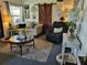 Cozy living room with comfortable seating, barn door and stylish décor at 1422 Indiana Ave, St Cloud, FL 34769