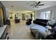 Spacious living room with an open layout, tile flooring, and comfortable seating, perfect for gatherings at 1966 Derby Glen Dr, Orlando, FL 32837