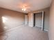 Bedroom with neutral carpet, closet with folding doors, and ceiling fan at 2801 Christy Ln, St Cloud, FL 34772