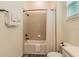 Bright bathroom featuring a shower and bathtub combo with white porcelain toilet and vanity at 2958 Salted Rim Rd, Kissimmee, FL 34747