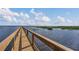 Picturesque boardwalk offering stunning water views within the community at 3050 Grasmere View Pkwy, Kissimmee, FL 34746