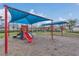 Community playground featuring slides, swings, and shaded play areas at 3050 Grasmere View Pkwy, Kissimmee, FL 34746