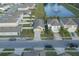 Aerial view of the neighborhood near a pond at 3211 Surfbird St, Kissimmee, FL 34744