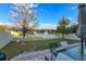 A serene view of the fountain on the lake from the cozy backyard at 3211 Surfbird St, Kissimmee, FL 34744