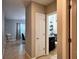 Hallway view towards a living room and into a bathroom at 3211 Surfbird St, Kissimmee, FL 34744