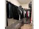 Spacious walk-in closet featuring custom organization and storage solutions at 3211 Surfbird St, Kissimmee, FL 34744