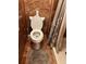 Bathroom with decorative brown tiled walls, toilet, gray rug, and shower with patterned curtain at 350 Corsica Ct, Kissimmee, FL 34758