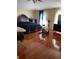 Spacious main bedroom showcasing hardwood floors, a large bed, and natural light at 350 Corsica Ct, Kissimmee, FL 34758