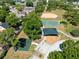 Community park featuring a playground, basketball court, and baseball diamond surrounded by lush trees at 3741 Crossing Creek Blvd, St Cloud, FL 34772