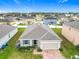 An elevated view of the property highlighting its location in a residential community at 417 Tisone Ln, Davenport, FL 33837