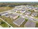 Overhead image showing the property in a community with nearby street and a greenway at 417 Tisone Ln, Davenport, FL 33837