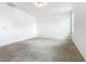 Neutral bedroom with neutral carpet flooring and ceiling light at 417 Tisone Ln, Davenport, FL 33837