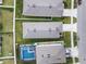 Aerial view of the property highlighting the roofline and spacious lot at 444 Lily Ln, Davenport, FL 33837