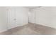 Bedroom featuring neutral carpet and a closet at 444 Lily Ln, Davenport, FL 33837