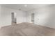 Bedroom with multiple doors and bright interior paint at 444 Lily Ln, Davenport, FL 33837