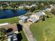 Lush property with home, carport and screened in pool backing onto a scenic lake at 4500 Lake Trudy Dr, St Cloud, FL 34769