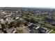 Aerial view of a residential neighborhood with tree-lined streets and well-maintained homes at 5445 Marvell Ave, Orlando, FL 32839