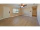 Inviting living room with tile flooring, a bright window, and a welcoming atmosphere at 5445 Marvell Ave, Orlando, FL 32839