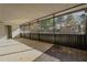 Covered screened porch with a view of the backyard pool, providing outdoor space at 5445 Marvell Ave, Orlando, FL 32839