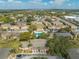 Aerial view of the Carrington Park community, highlighting the pool, buildings, and parking area at 562 Flemming Way # 200, Maitland, FL 32751