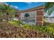 The Carrington Park community sign amidst lush greenery on a bright day at 562 Flemming Way # 200, Maitland, FL 32751