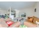 Inviting living room leading into kitchen with bar top at 562 Flemming Way # 200, Maitland, FL 32751