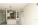 Eat-in kitchen featuring vintage light fixture and room for a breakfast bar at 6332 Bayberry Ne Blvd, Winter Haven, FL 33881