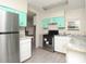 Updated kitchen with stainless steel appliances and bright accents at 6332 Bayberry Ne Blvd, Winter Haven, FL 33881
