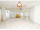 Open floor plan with a large living room, tile floor and light-filled interior at 6332 Bayberry Ne Blvd, Winter Haven, FL 33881