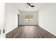 Bright, vacant bedroom features sleek flooring and a ceiling fan fixture at 6430 Sw 144Th Street Rd, Ocala, FL 34473