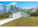 This home boasts a two-car garage at 6430 Sw 144Th Street Rd, Ocala, FL 34473