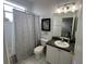 Clean bathroom with a shower and vanity with a dark countertop at 723 Tuscan Hills Blvd, Davenport, FL 33897