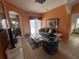 Bright living room with sliding glass doors and a comfortable sofa at 723 Tuscan Hills Blvd, Davenport, FL 33897