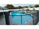 Pool and hot tub enclosed with black fencing at 7860 Kensingham Ct, Orlando, FL 32835