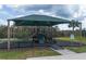 Community playground featuring covered play equipment, slides, and climbing structures for outdoor fun at 953 Cambridge Dr, Winter Haven, FL 33881